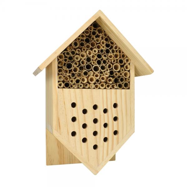 Wooden bee house with cylindrical holes on a white background